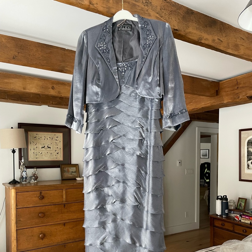 Worn once to Wedding. Fits small more like a 10 or medium